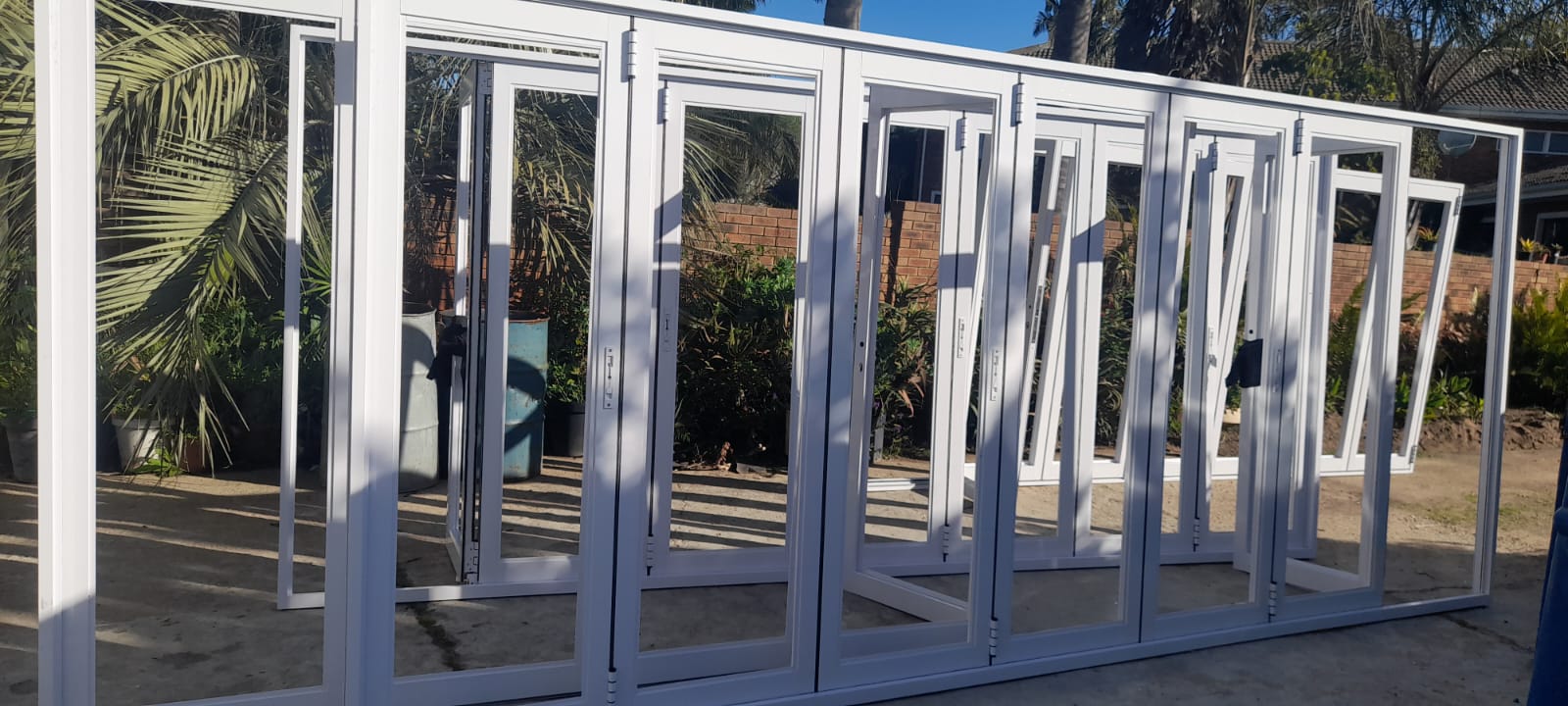 White aluminium folding doors